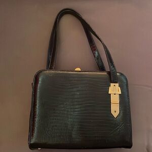 Block vintage leather purse, gold interior.